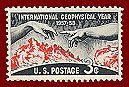 U.S. stamp of solar flare and Michelangelo hands of God and Adam