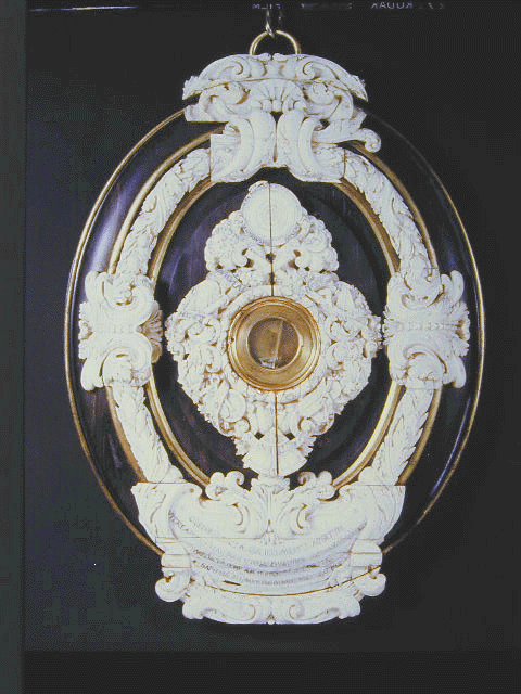 Lens from a Galileo telescope, in elaborate ivory stand