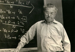 Hoyle lecturing at a chalk board